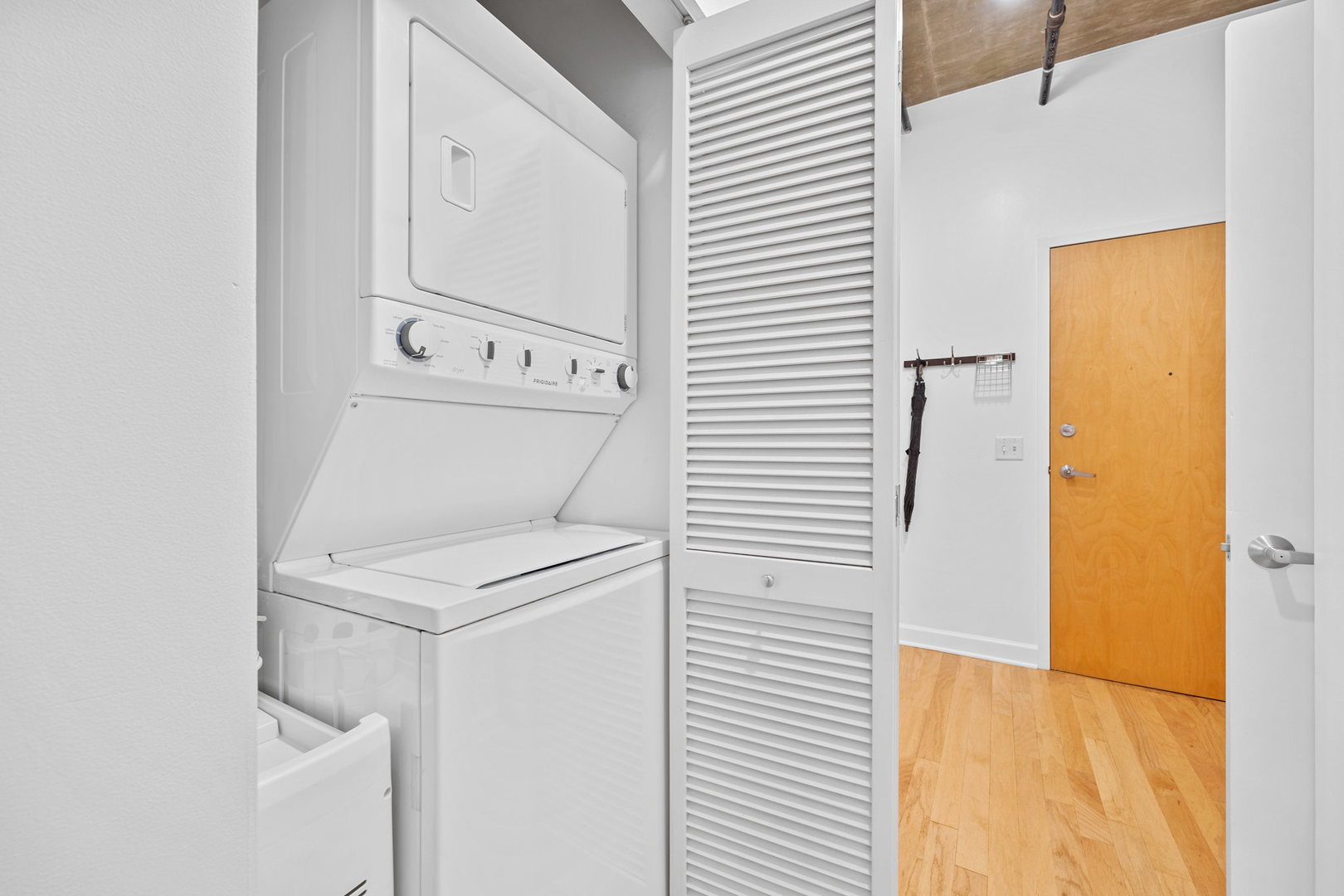 111 South Morgan Street, Unit 707 Chicago, IL 60607 - Photo 19 of 22 a view of washer and dryer