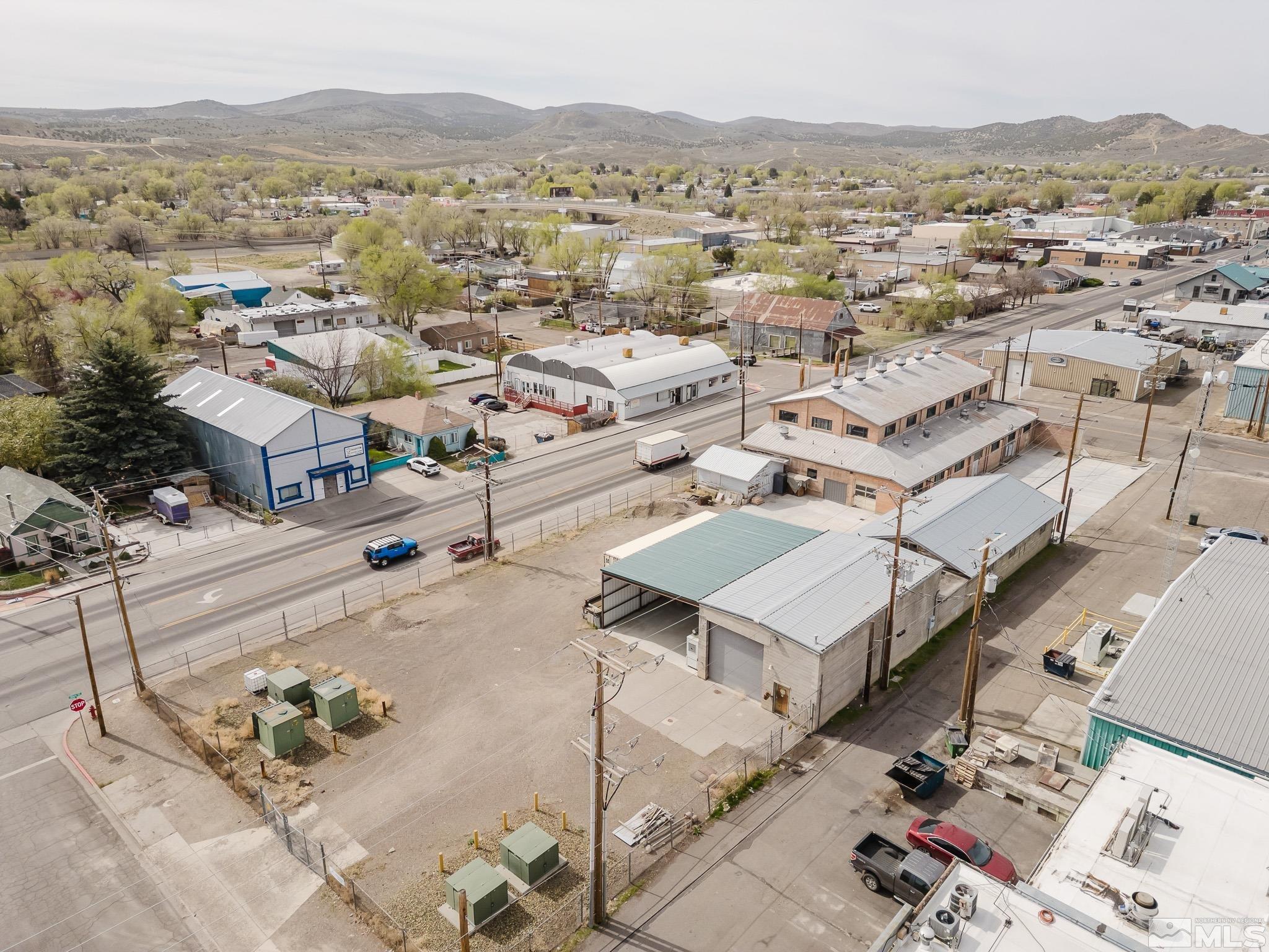 240 7th Street Elko, NV 89801 - Photo 13 of 40 an aerial view of a houses with a city view