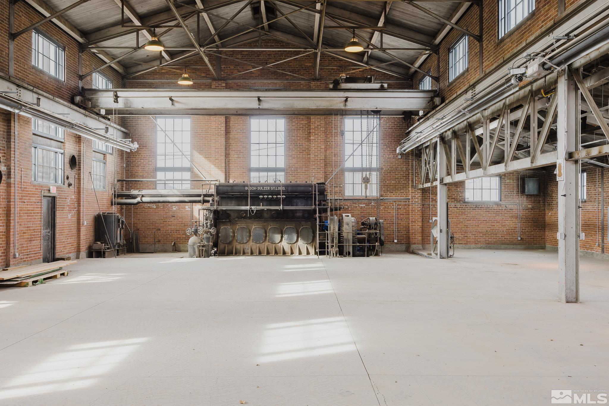 240 7th Street Elko, NV 89801 - Photo 15 of 40 a view of an empty room with a fireplace