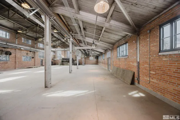 a view of a room with wooden walls