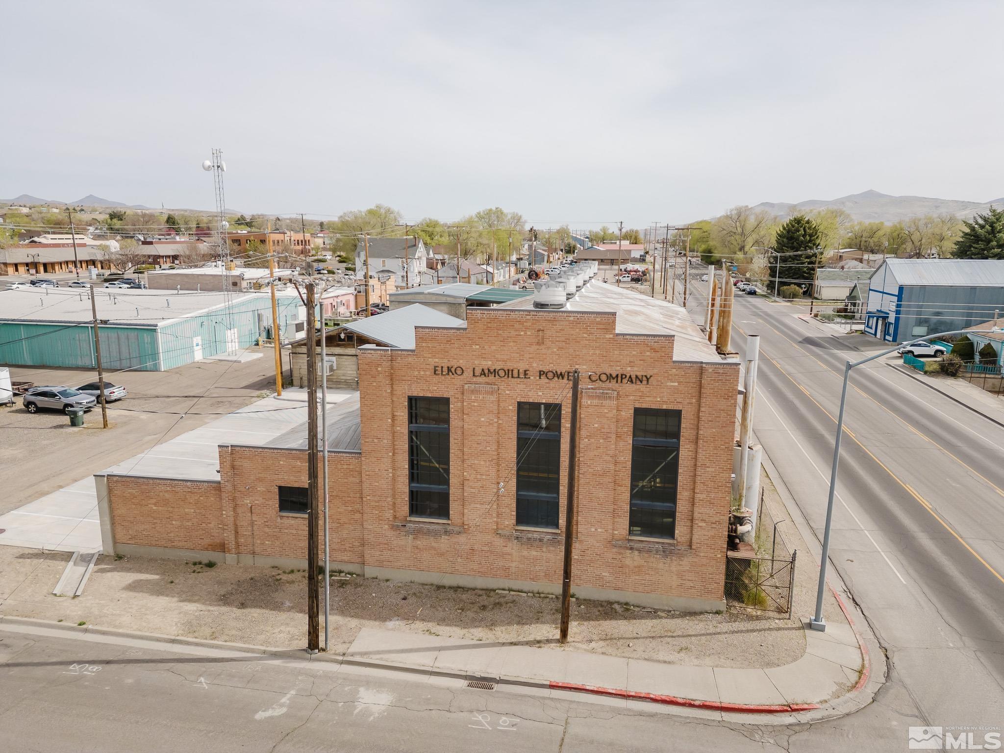240 7th Street Elko, NV 89801 - Photo 2 of 40 a city view with tall buildings
