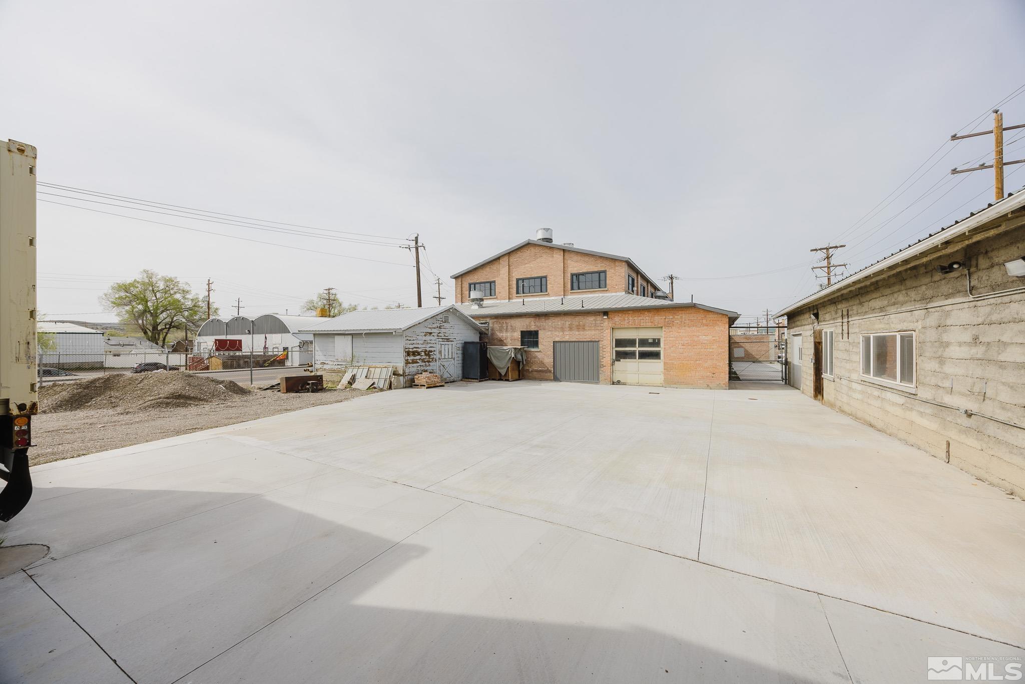 240 7th Street Elko, NV 89801 - Photo 38 of 40 a view of a house with a car parked in front of it