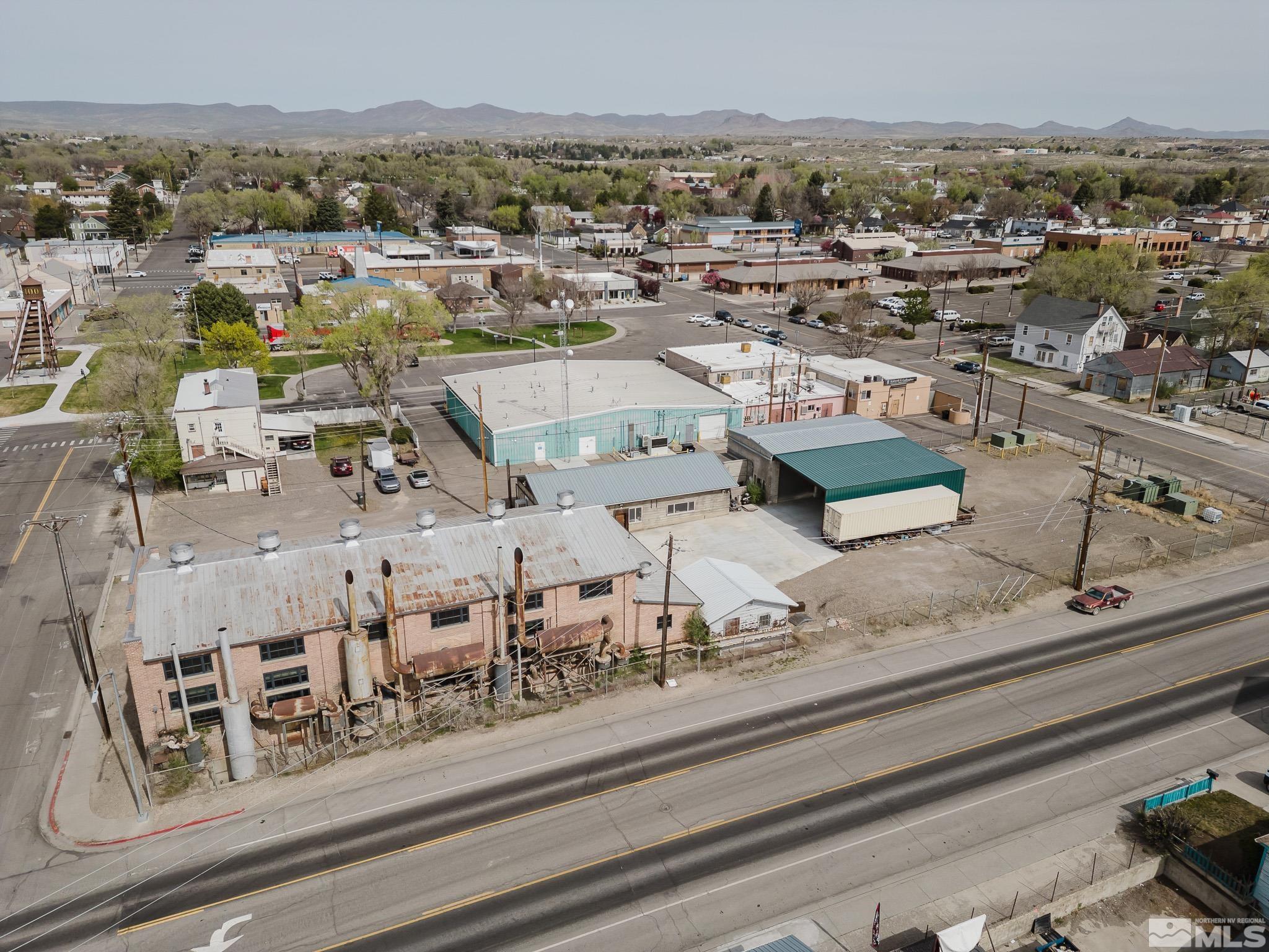240 7th Street Elko, NV 89801 - Photo 7 of 40 an aerial view of residential houses with outdoor space