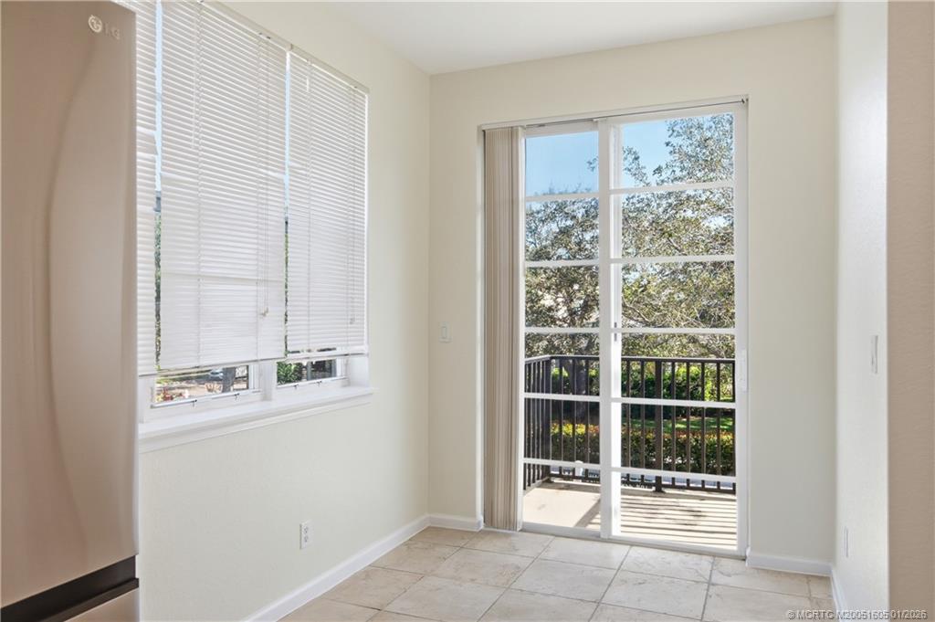 103 Cat Rock Lane Jupiter, FL 33458 - Photo 20 of 32 a view of an entryway with a window