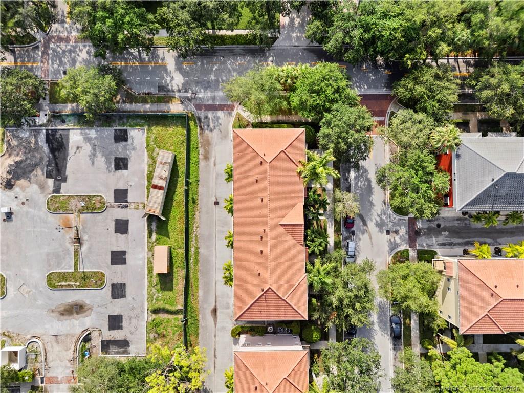 103 Cat Rock Lane Jupiter, FL 33458 - Photo 32 of 32 an aerial view of multiple houses with yard