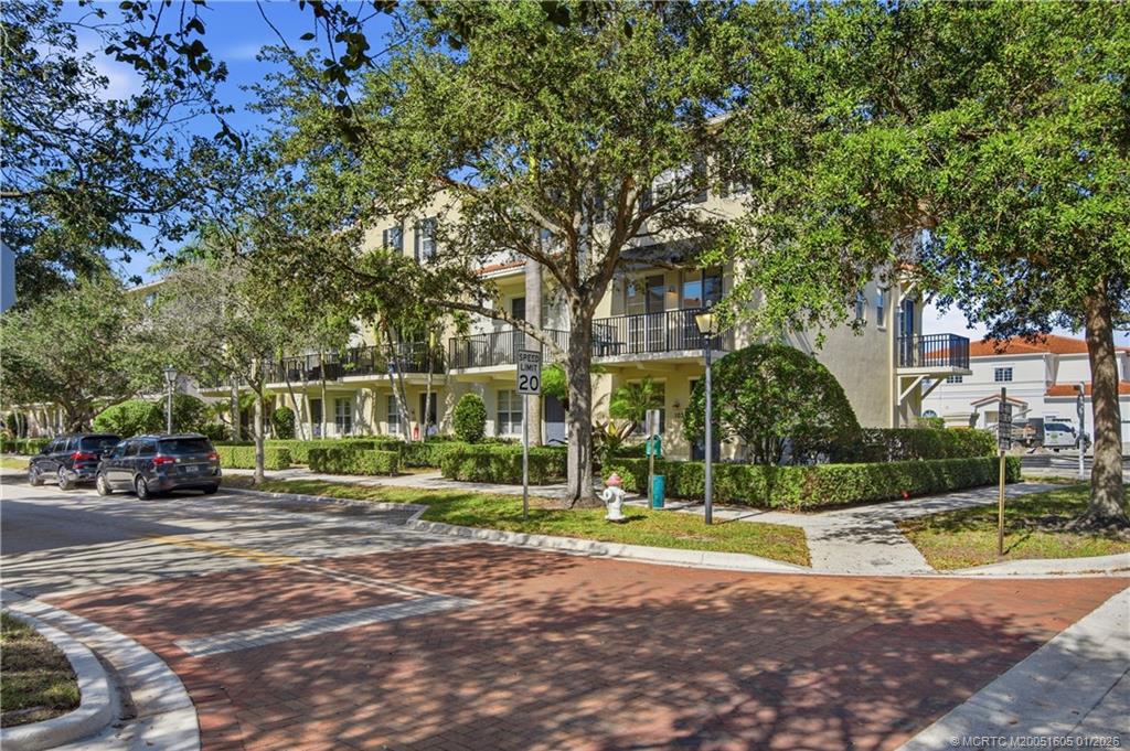 103 Cat Rock Lane Jupiter, FL 33458 - Photo 4 of 32 a view of a park with large trees