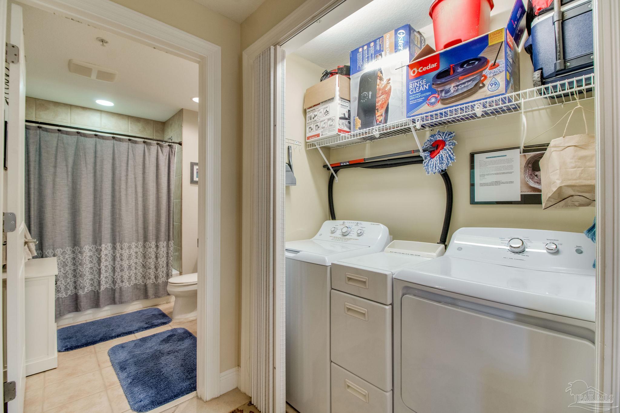612 Lost Key Drive, Unit 405B Pensacola, FL 32507 - Photo 39 of 71 a utility room with dryer and washer