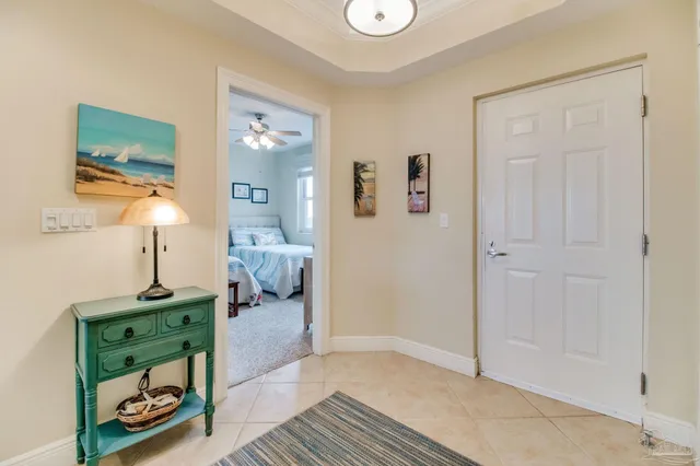 a dining room with furniture window and wooden floor