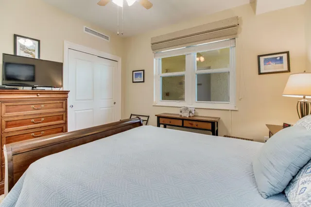 a view of a terrace with chair and lake view