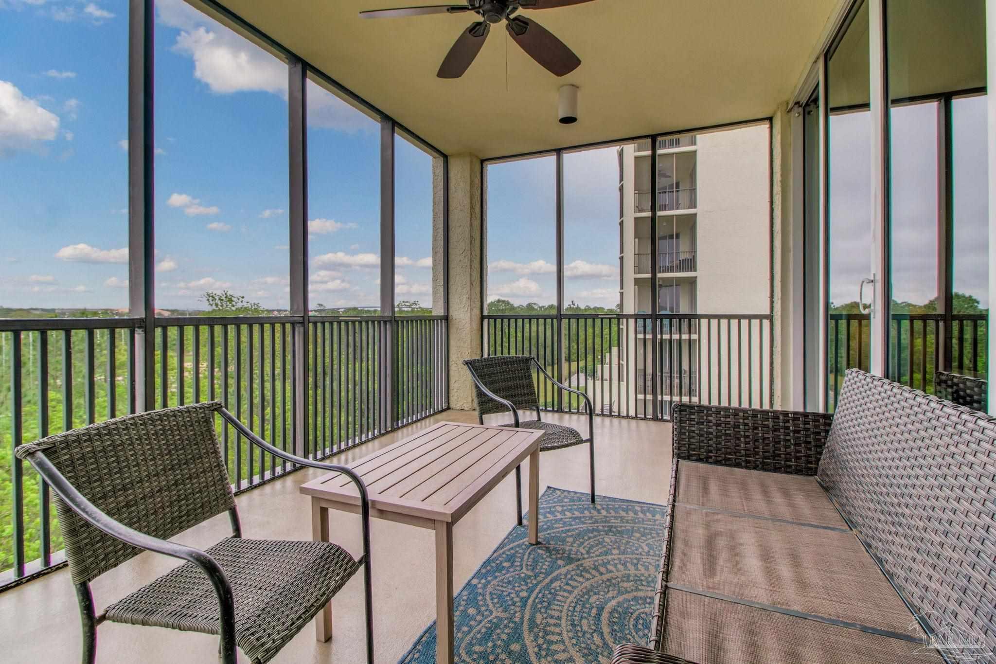 612 Lost Key Drive, Unit 405B Pensacola, FL 32507 - Photo 50 of 71 a balcony with a couch