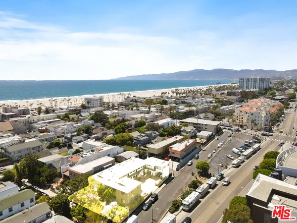 an aerial view of residential building and street