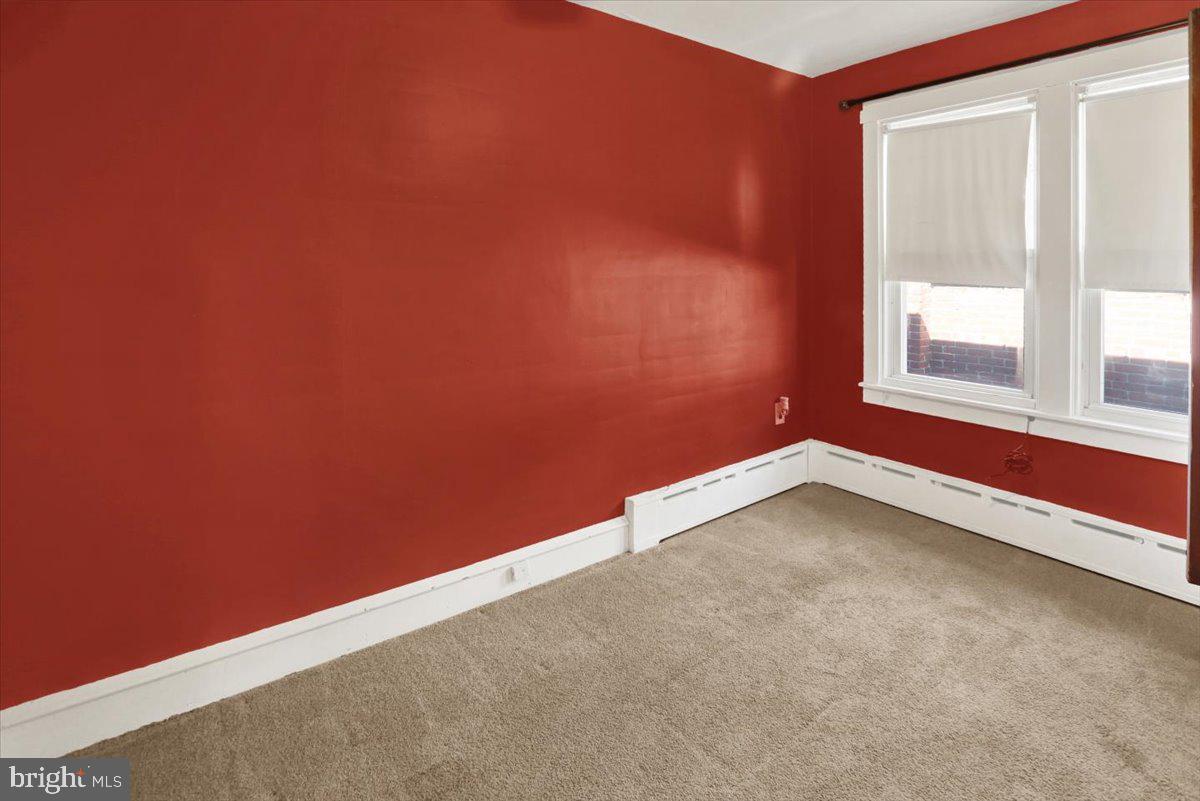 29 Arlington Street Reading, PA 19611 - Photo 21 of 32 an empty room with a window