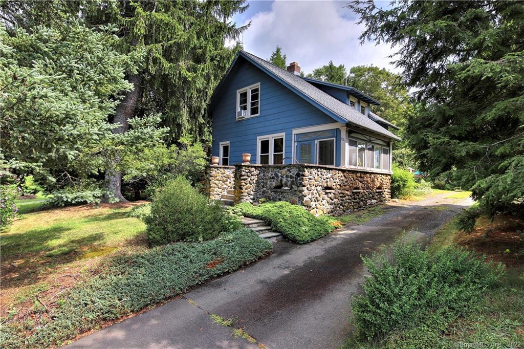 821 Racebrook Road Orange, CT 06477 - Photo 1 of 1 a view of a yard in front of house