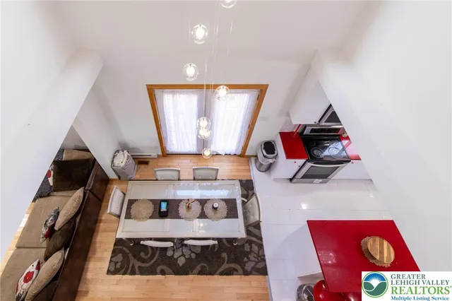 a view of living room with furniture and a window