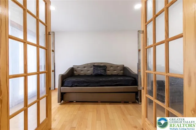 a living room with a couch and a window