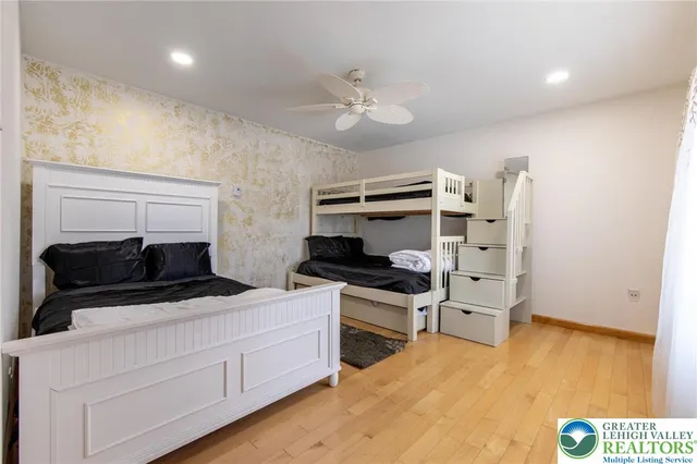 a kitchen with stainless steel appliances a stove a microwave and a refrigerator