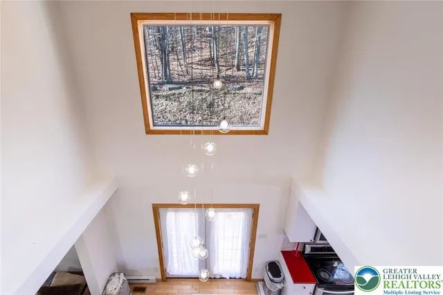 a view of a hallway with workspace