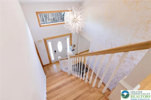 a view of entryway with wooden floor