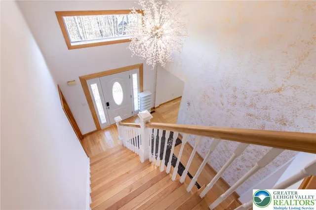 a view of entryway with wooden floor