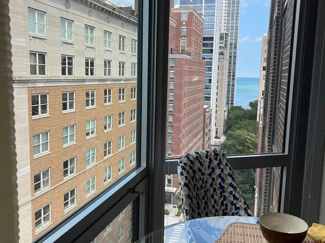 a view of balcony with furniture