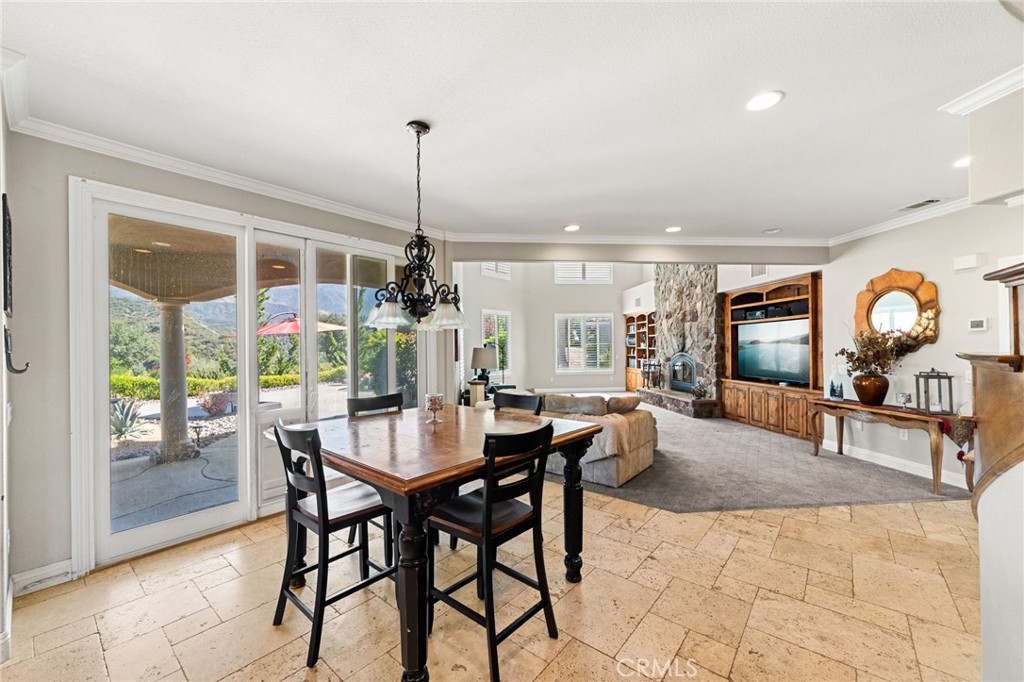 38136 Butterfly Court Yucaipa, CA 92399 - Photo 38 of 71 a view of a dining room with furniture window and outside view