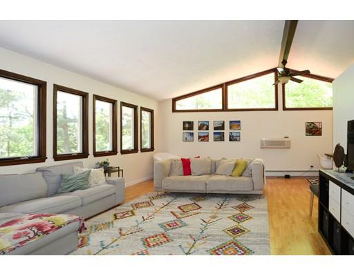 25 Nixon Road Framingham, MA 01701 - Photo 4 of 28 a living room with furniture and a large window