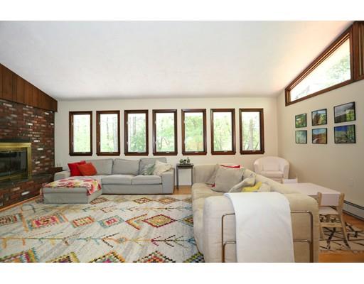 25 Nixon Road Framingham, MA 01701 - Photo 5 of 28 a living room with furniture and a large window