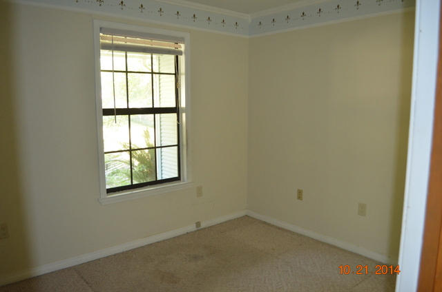 166 Ridge Lake Road Crestview, FL 32536 - Photo 12 of 19 an empty room with a window