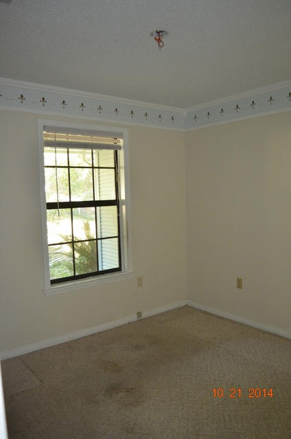166 Ridge Lake Road Crestview, FL 32536 - Photo 13 of 19 an empty room with a window