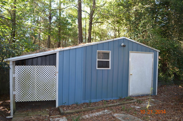 166 Ridge Lake Road Crestview, FL 32536 - Photo 2 of 19 a front view of a house with a tree