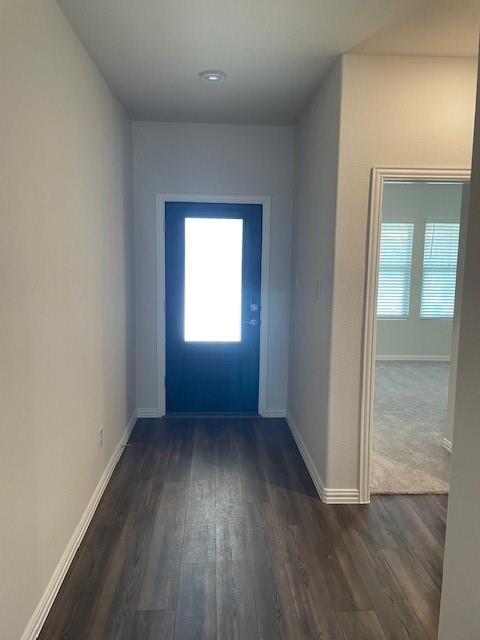 3116 Kingsgarden Road Denton, TX 76207 - Photo 2 of 20 an empty room with wooden floor and windows