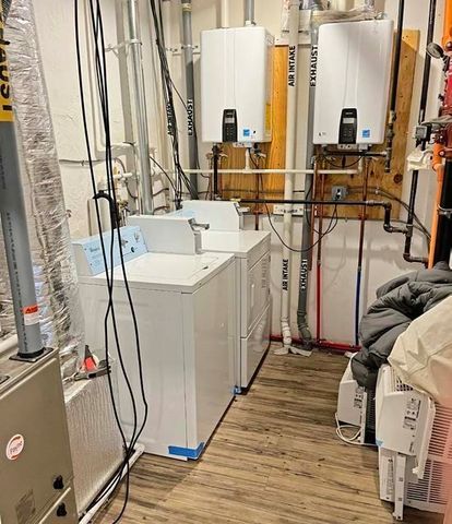a bathroom with a sink a mirror and shower