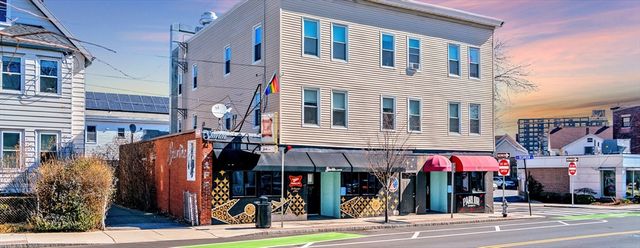 a view of street with shops
