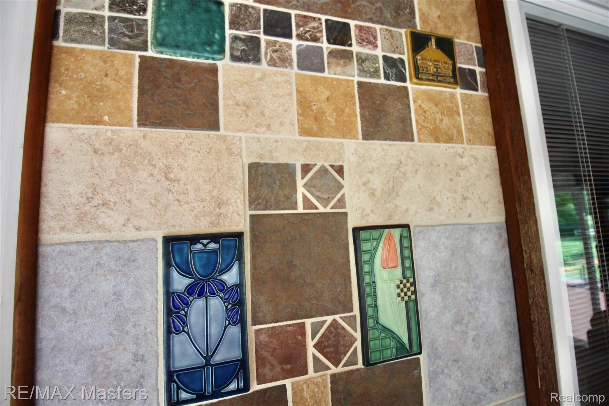 25777 Inkster Road Flat Rock, MI 48134 - Photo 13 of 52 Details show it's an artistic ceramic tile wall featuring Pewabic tiles from Detroit's most famous artists!