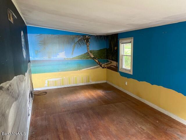 263 Shore Road Richmond, MA 01201 - Photo 17 of 21 a view of a room with wooden floor and windows