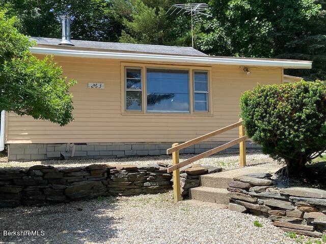 263 Shore Road Richmond, MA 01201 - Photo 3 of 21 a view of a house with a patio