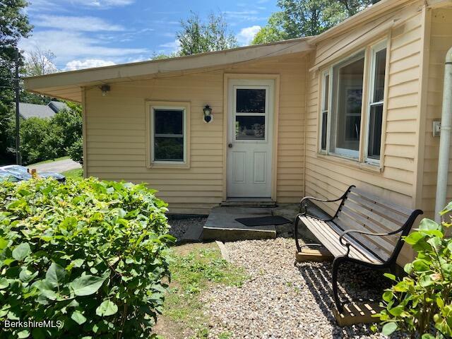 263 Shore Road Richmond, MA 01201 - Photo 6 of 21 a view of a backyard with chairs