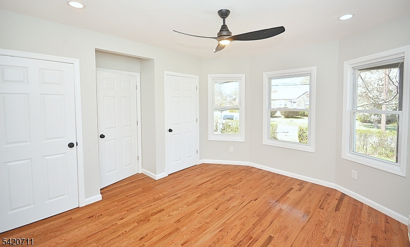 1324 George Street Plainfield, NJ 07062 - Photo 20 of 26 a bedroom with a bed and a window