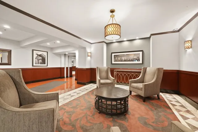 a view of a patio with a table and chairs