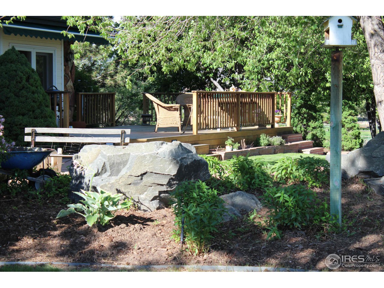 9257 Gunbarrel Ridge Road Boulder, CO 80301 - Photo 17 of 21 a view of a backyard with sitting area