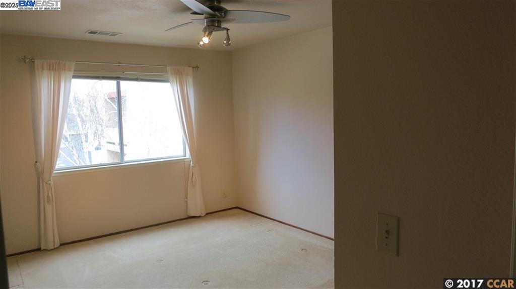 1310 Walden Road, Unit 11 Walnut Creek, CA 94597 - Photo 16 of 26 an empty room with a window