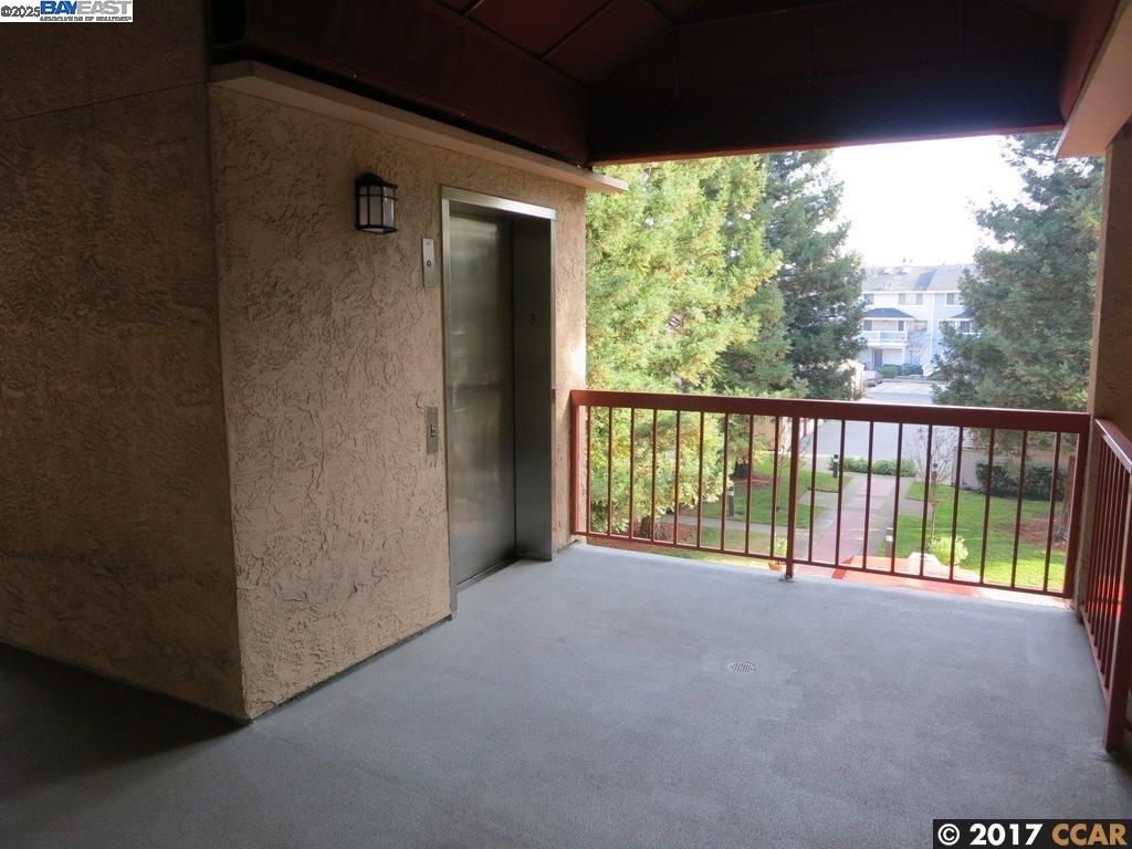 1310 Walden Road, Unit 11 Walnut Creek, CA 94597 - Photo 8 of 26 a view of a glass door and an outdoor space