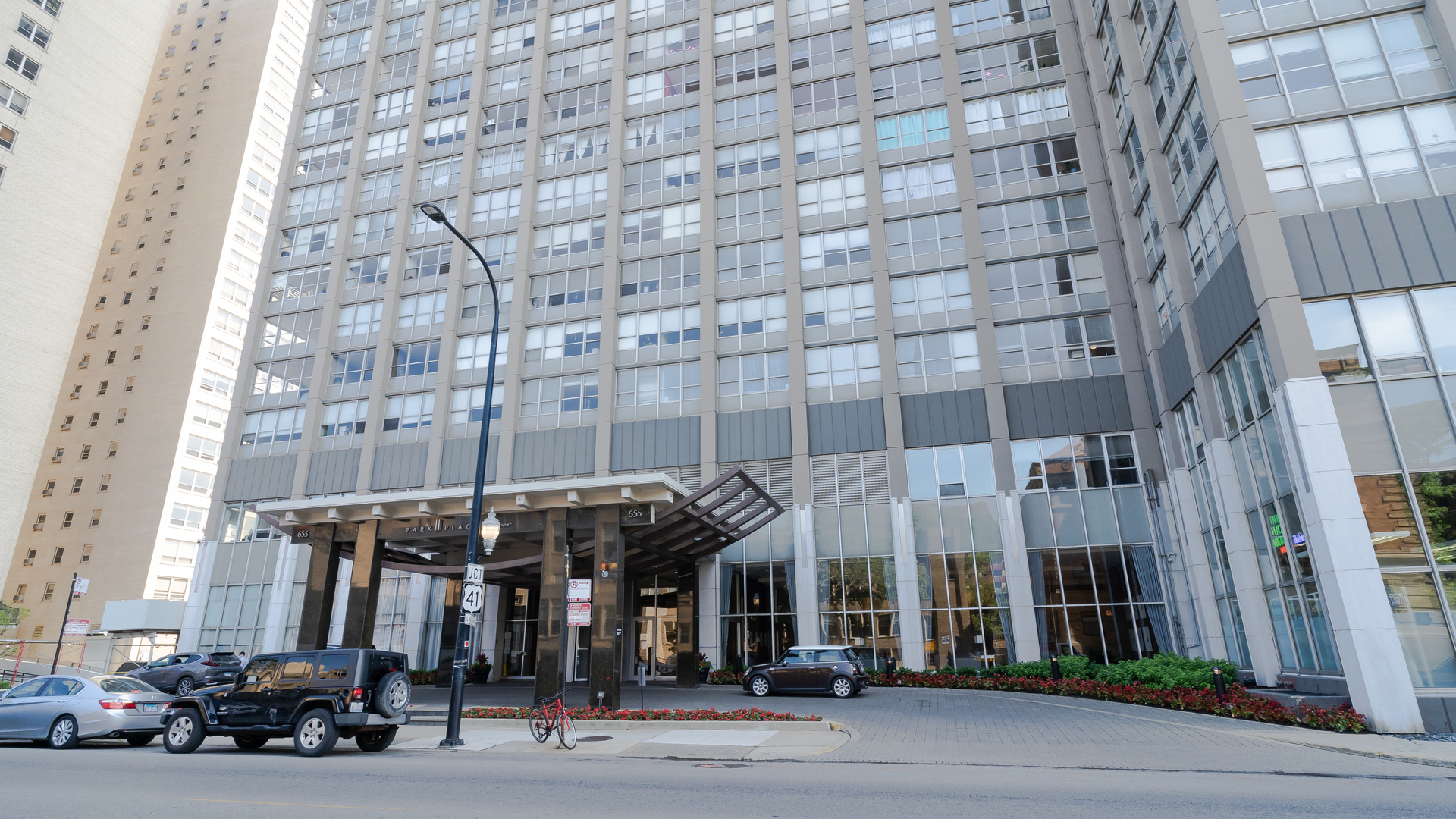 655 West Irving Park Road, Unit 803 Chicago, IL 60613 - Photo 1 of 25 a view of a building with a street