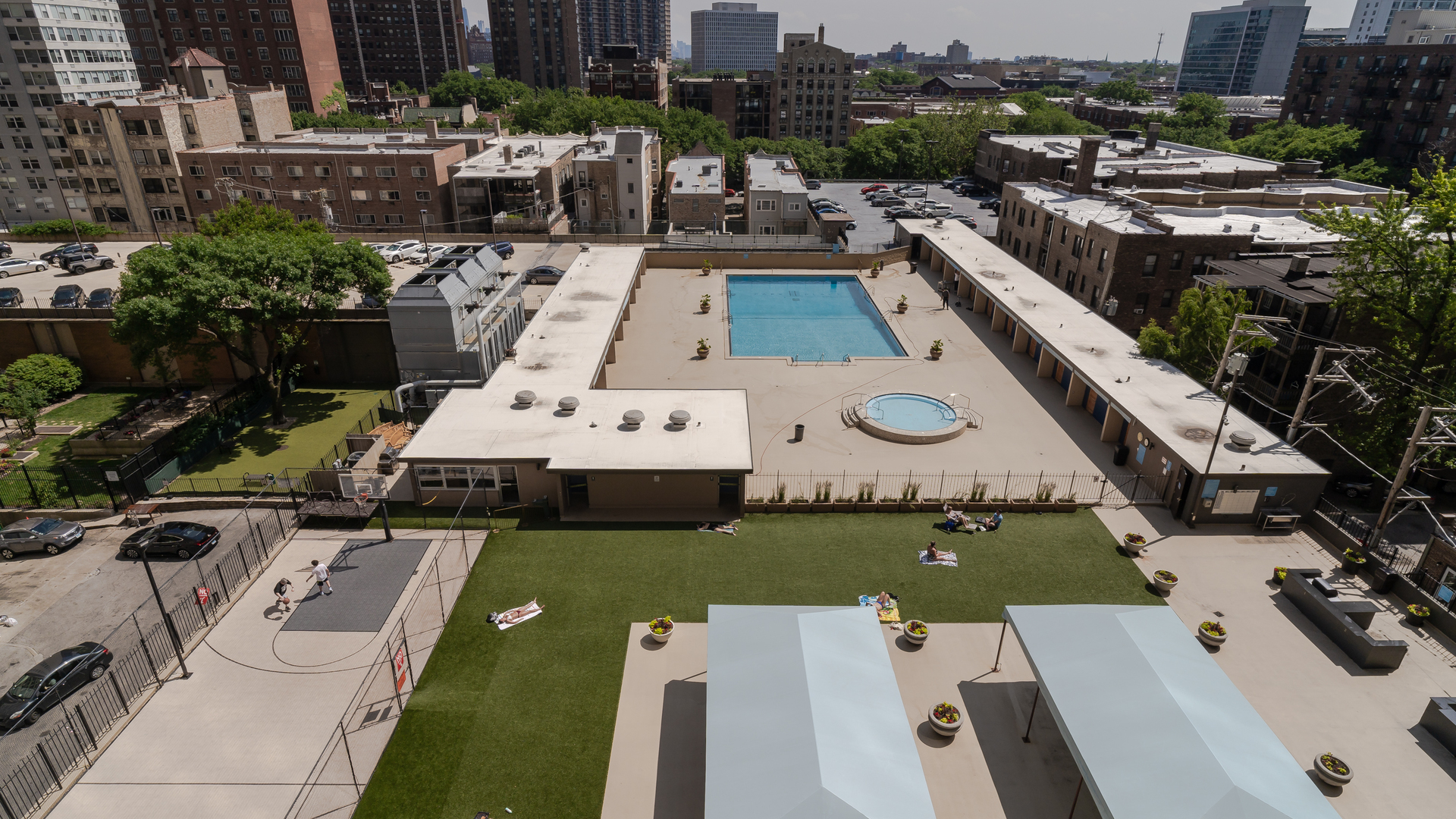 655 West Irving Park Road, Unit 803 Chicago, IL 60613 - Photo 16 of 25 a view of yard with swimming pool outdoor seating