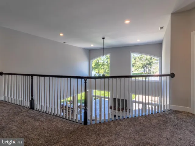 a view of swimming pool with outdoor seating