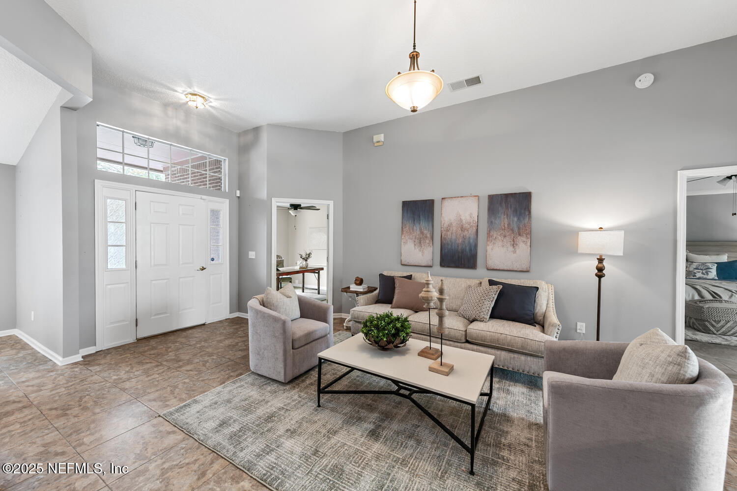 113 Nottingham Drive St. Johns, FL 32259 - Photo 34 of 35 a living room with furniture and a lamp