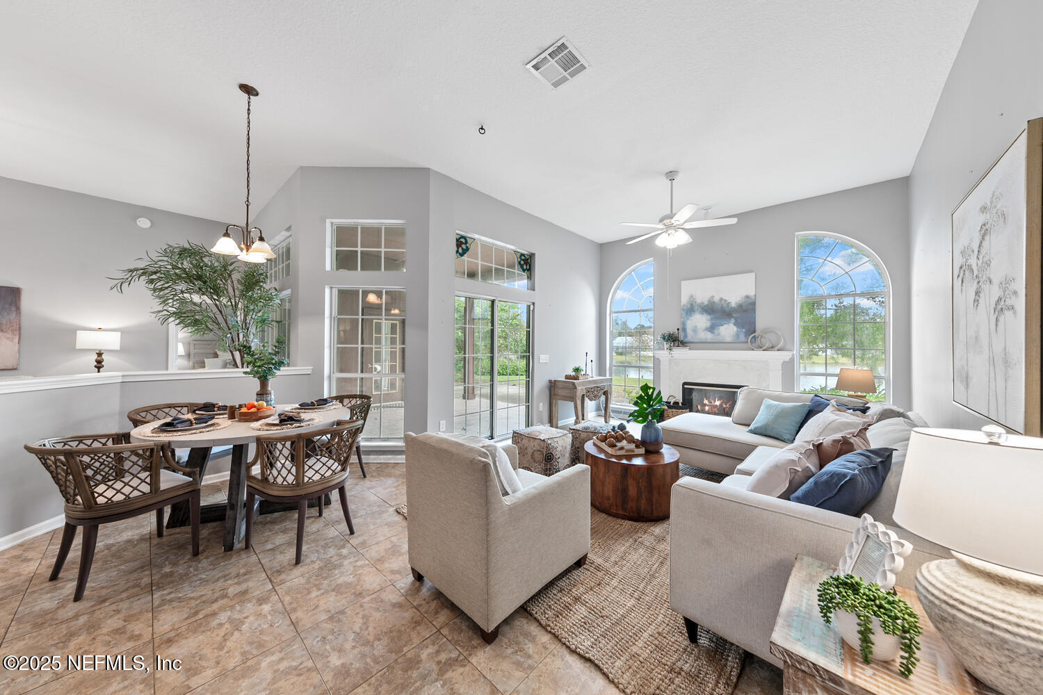 113 Nottingham Drive St. Johns, FL 32259 - Photo 12 of 35 a living room with furniture and a large window