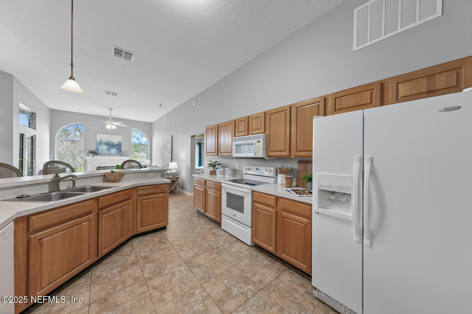 113 Nottingham Drive St. Johns, FL 32259 - Photo 15 of 35 a large kitchen with cabinets stainless steel appliances and a window