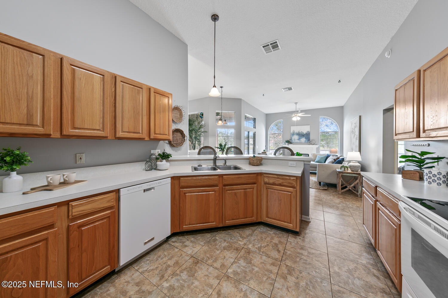 113 Nottingham Drive St. Johns, FL 32259 - Photo 16 of 35 a kitchen with sink and white cabinets