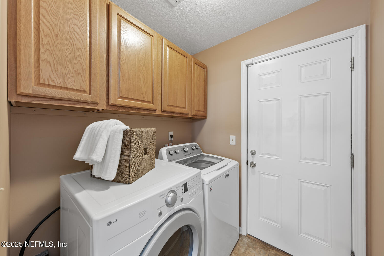 113 Nottingham Drive St. Johns, FL 32259 - Photo 17 of 35 a view of storage and utility room with washer and dryer